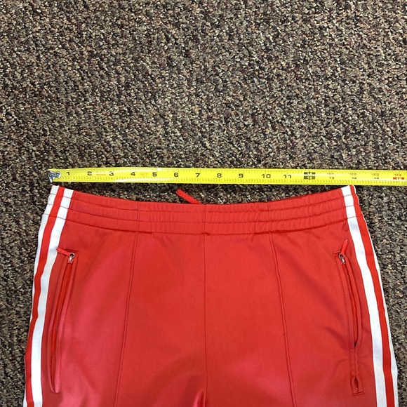Vintage Adidas Track Pants women's size Small
Zip Leg Elastic drawstring waist - Picture 11 of 13